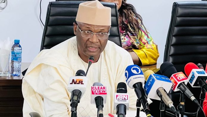 The INEC Chairman, Prof. Mahmoud Yakubu seen here addressing the press as he assured Nigerians of the use of BIVAS in capturing voters and at the same time, the transmission of election results on time from the polling booths to the IREV portal.