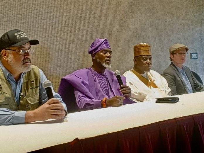 Mayor Mike Arnold addressing the press on his Fact-Finding Mission in Nigeria at Abuja Hilton Hotels on October 14th. 2025. He flanked on his left by by Reno Omokri