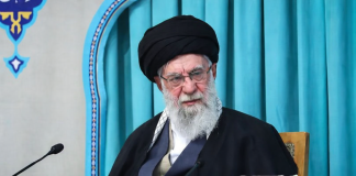 The Last Ayatollah: A Life That Shaped the Middle East Late Iranian Supreme LeaderA yatollah Khamenei behind lecter